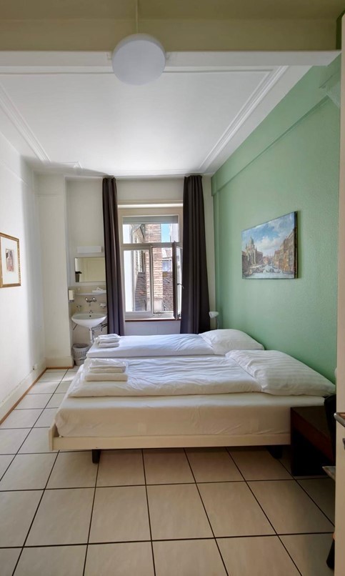 1 room apartment, Foto 2 von 3