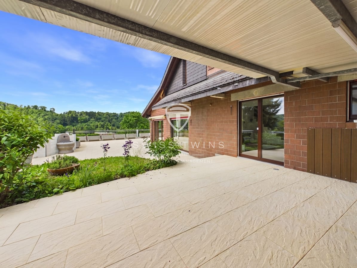 Casa a schiera con terrazza di 6 ½ locali
